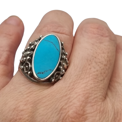 Vintage boho 925 silver ring with blue cabochon and ornamental filigree, circa 1980–1990