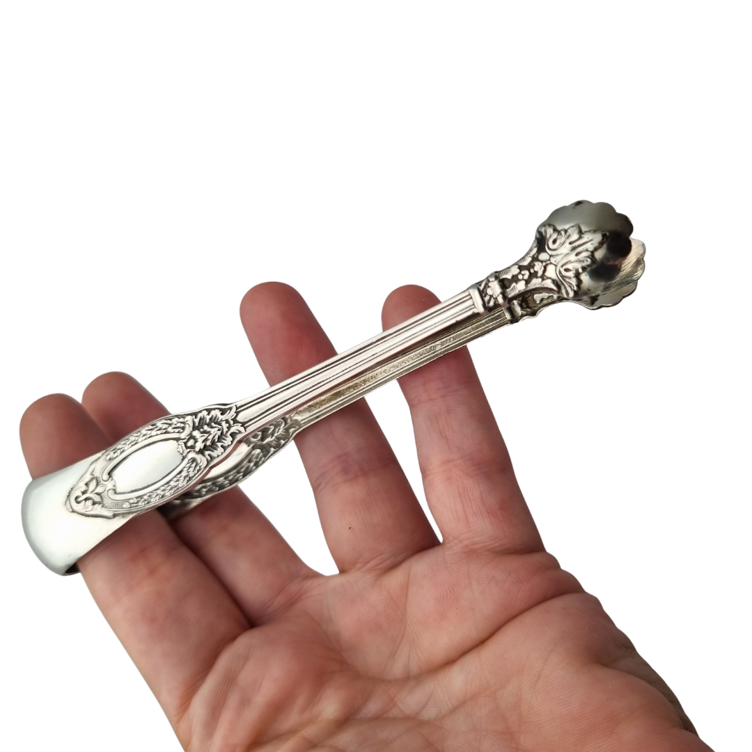 Pinzas para azúcar de plata francesa estilo rococó, plata 800, inicios siglo XX