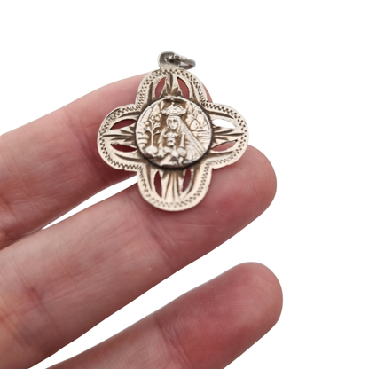 Antique openwork silver medal of the Virgin of Montserrat, Catalan devotional souvenir, ca. 1920-1950