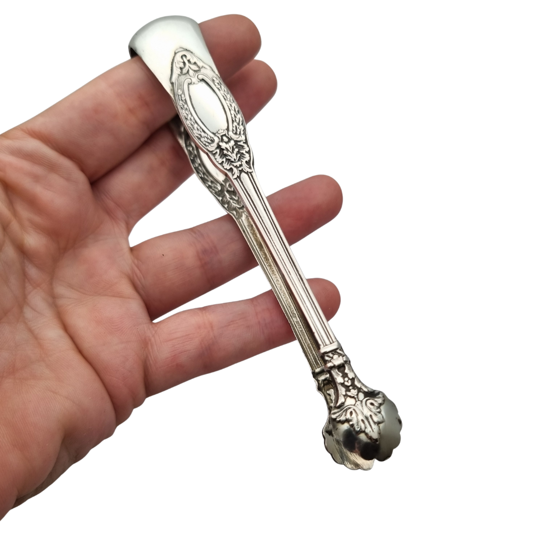 Pinzas para azúcar de plata francesa estilo rococó, plata 800, inicios siglo XX