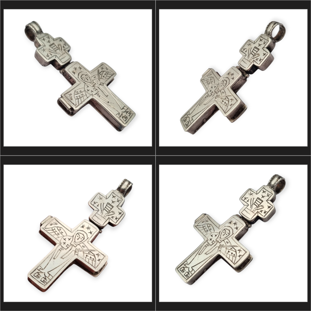 Antique Byzantine-style silver reliquary cross with engraved religious scenes.