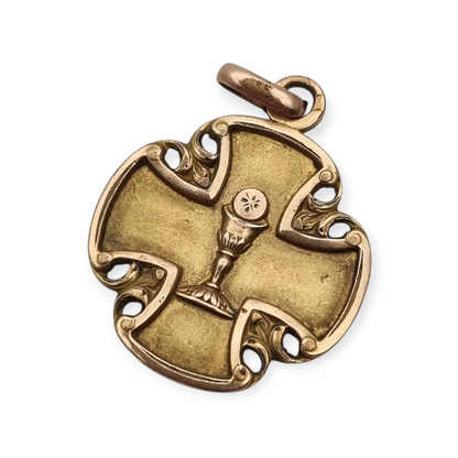 Antique religious medal in openwork gilt cross with chalice, circa 1920