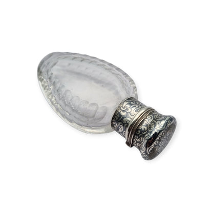Victorian perfume bottle in cut glass and nielloed silver, circa 1890