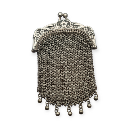 Art Nouveau silver coin purse with embossed floral clasp, circa 1900