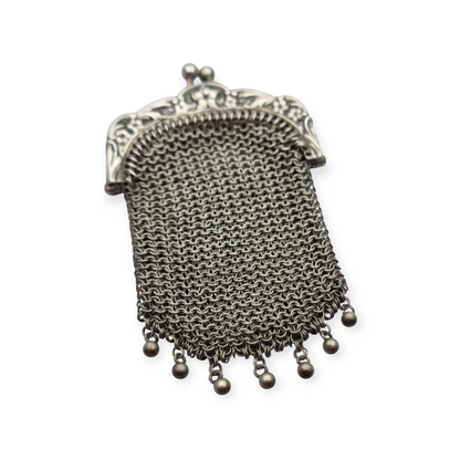 Art Nouveau silver coin purse with embossed floral clasp, circa 1900