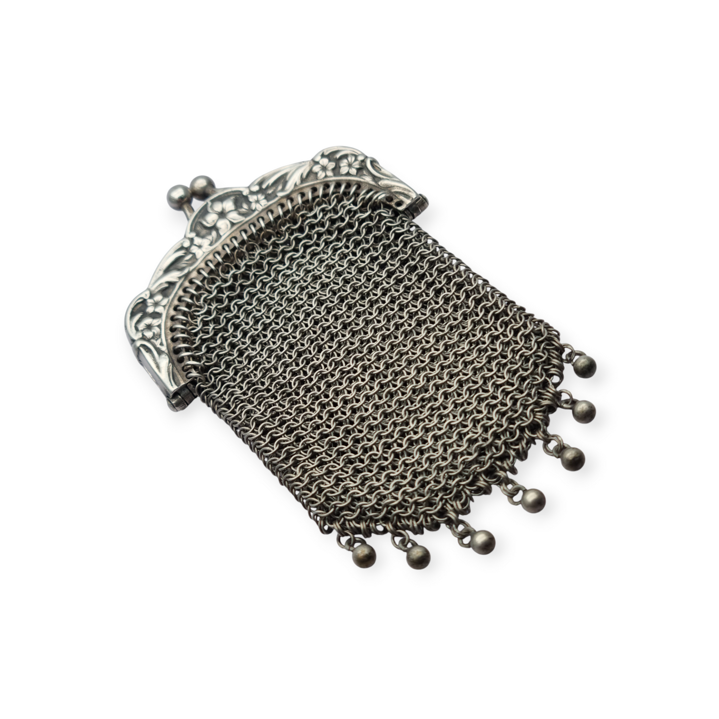 Art Nouveau silver coin purse with embossed floral clasp, circa 1900