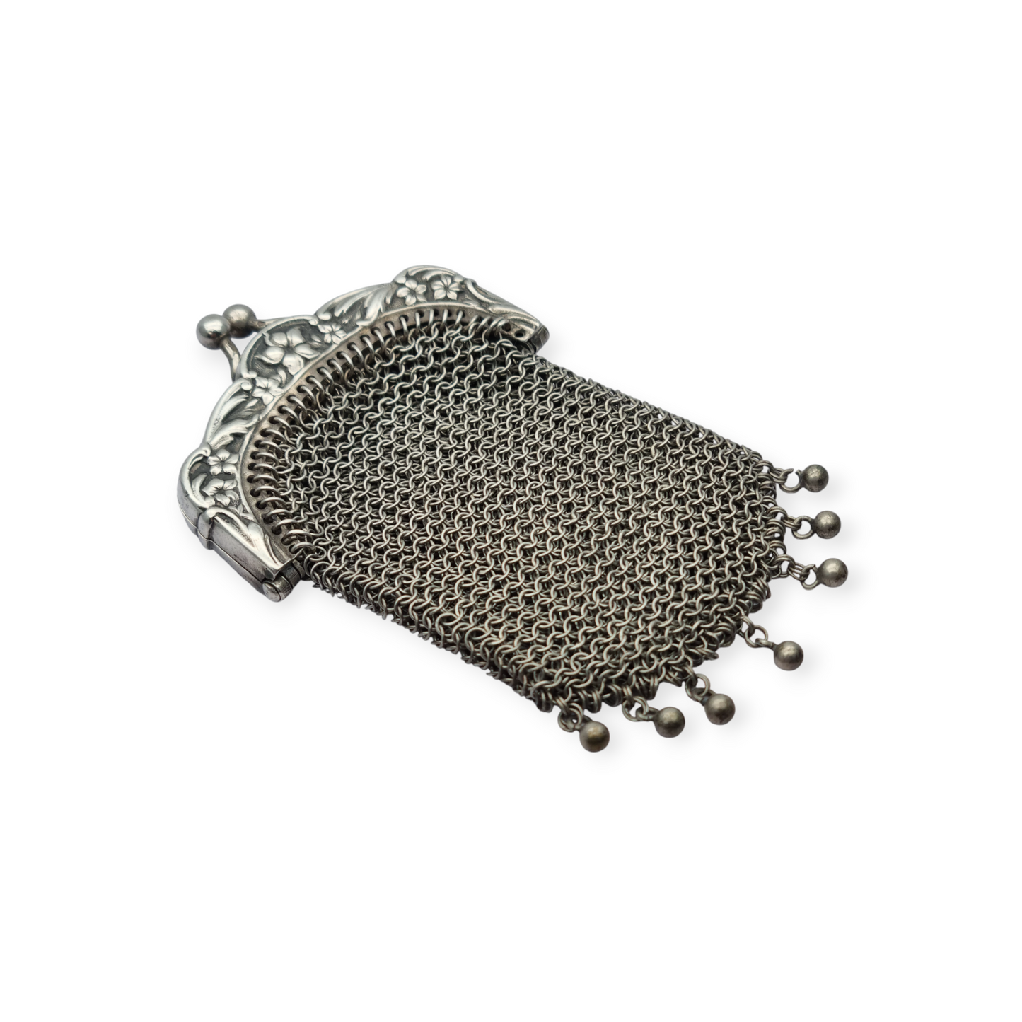 Art Nouveau silver coin purse with embossed floral clasp, circa 1900