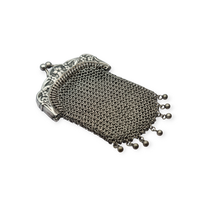 Art Nouveau silver coin purse with embossed floral clasp, circa 1900
