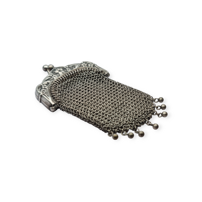 Art Nouveau silver coin purse with embossed floral clasp, circa 1900