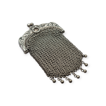 Art Nouveau silver coin purse with embossed floral clasp, circa 1900