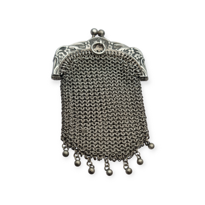 Art Nouveau silver coin purse with embossed floral clasp, circa 1900