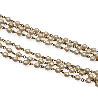 Vintage costume jewelry necklace with pearl tassel and turquoise bead, 1980s