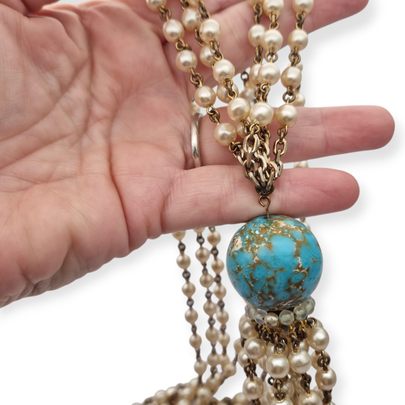 Vintage costume jewelry necklace with pearl tassel and turquoise bead, 1980s