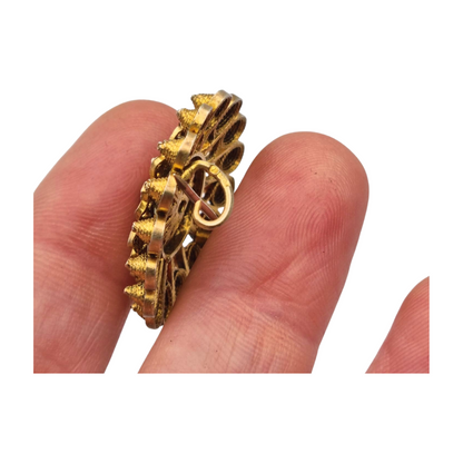 Floral brooch from the 1930s-40s in gilded silver with blue crystal and oriental filigree