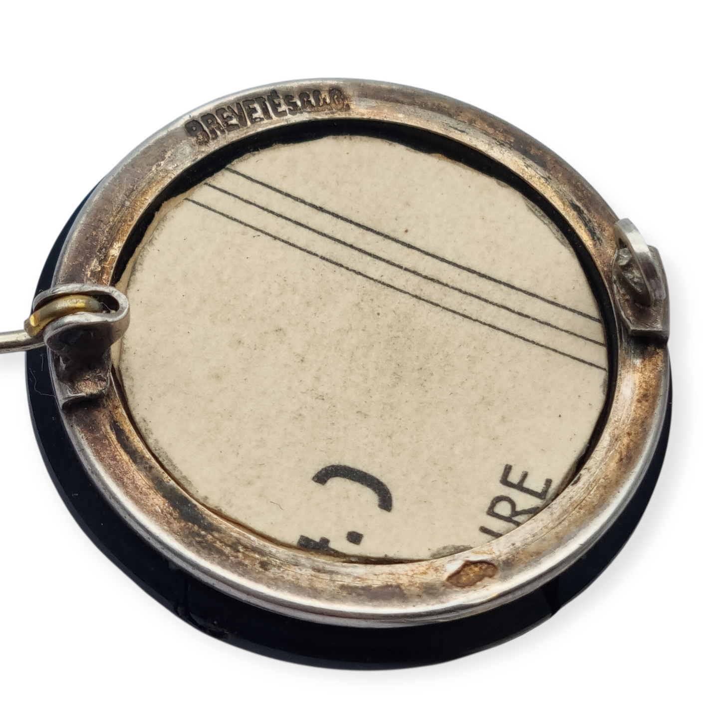 Guardapelo broche victoriano francés c.1900 en plata y vulcanita, “Breveté SGDG”