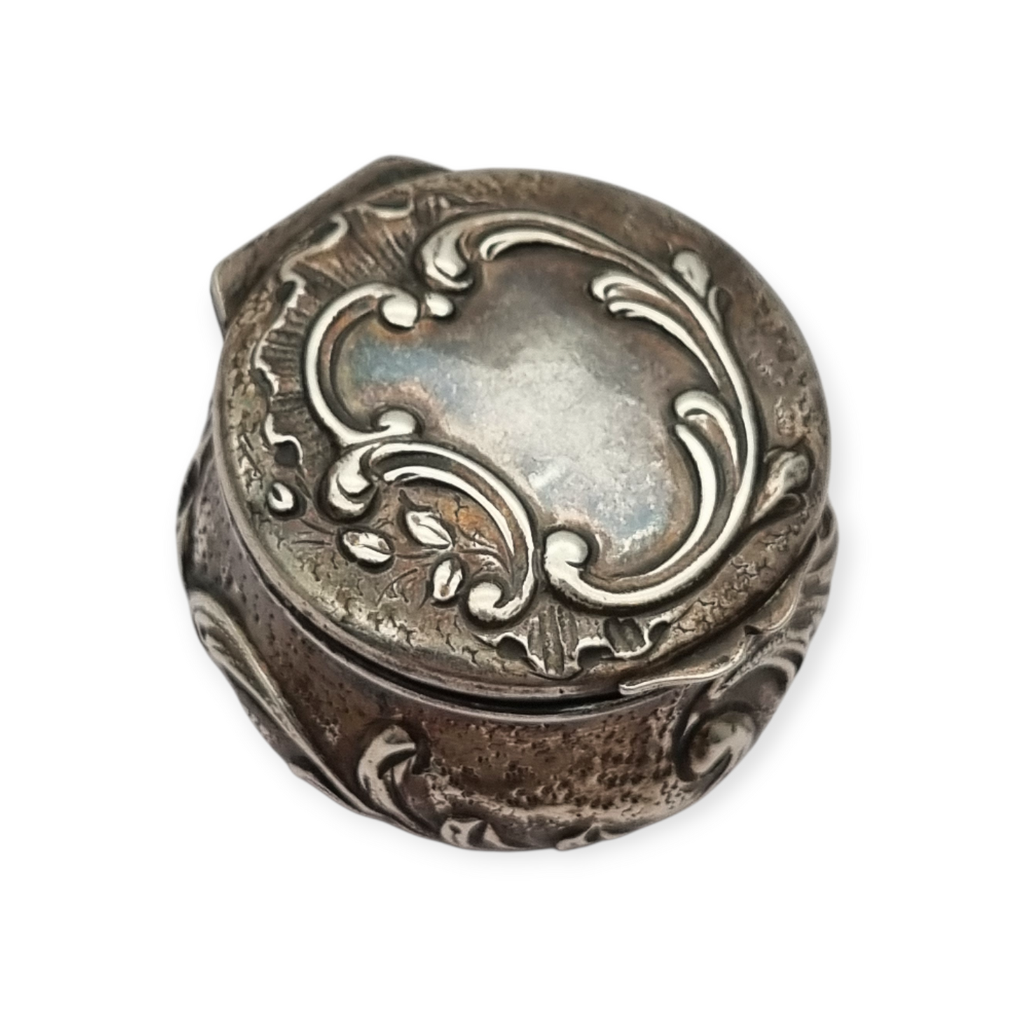 Art Nouveau silver chatelaine box with floral relief, signed JB, France, circa 1920.