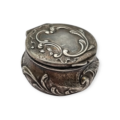 Art Nouveau silver chatelaine box with floral relief, signed JB, France, circa 1920.