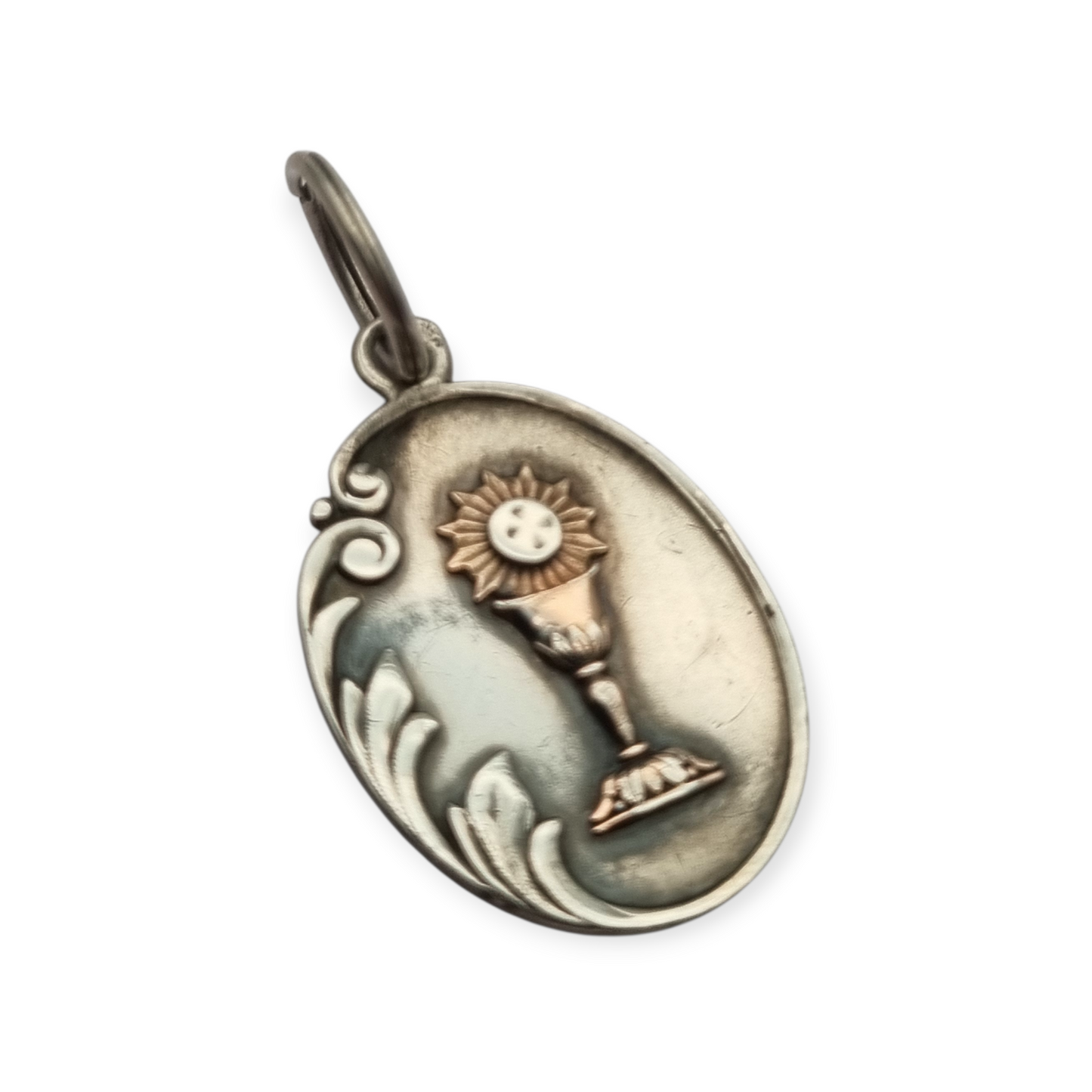 Silver medal pendant with chalice and host, European Art Nouveau design circa 1905