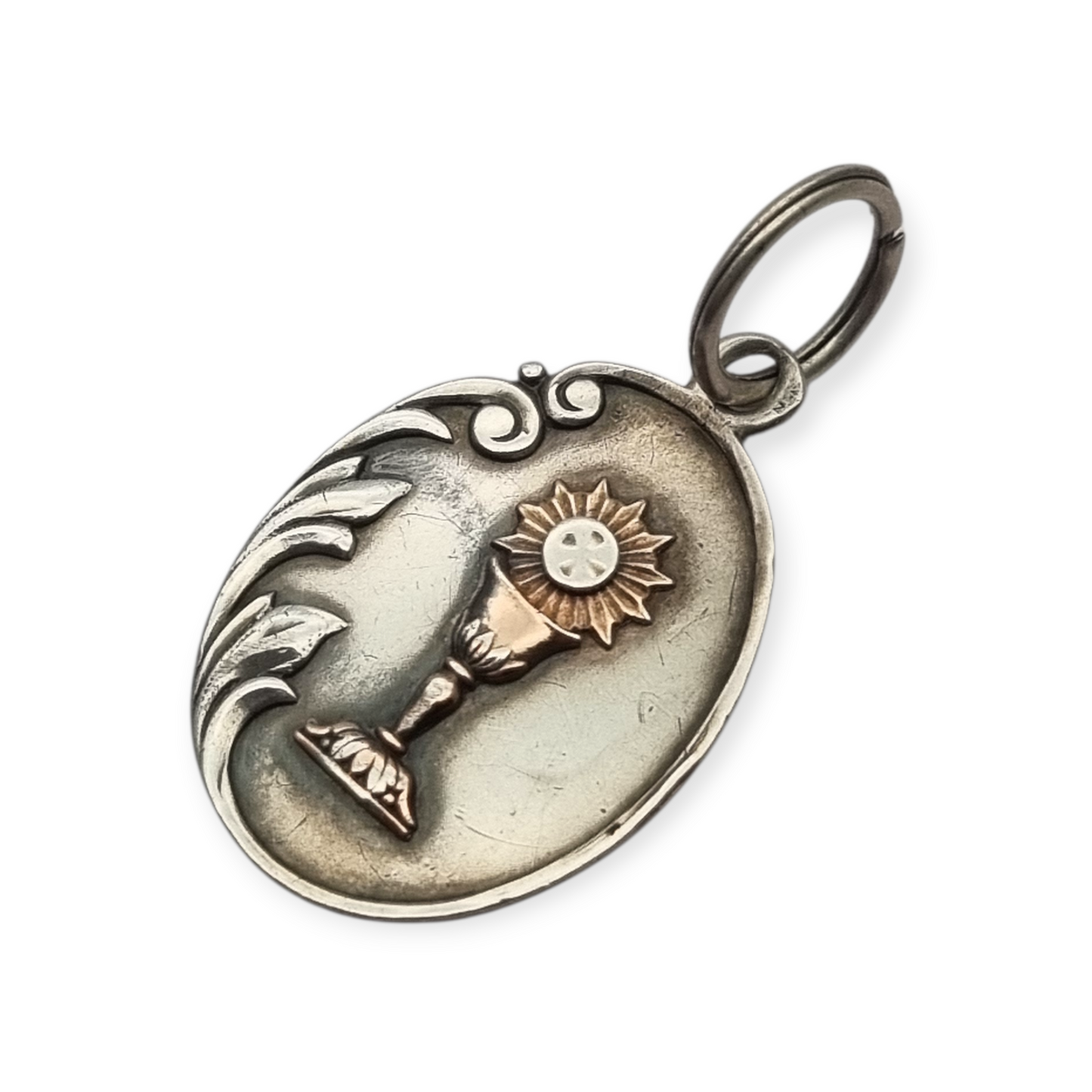 Silver medal pendant with chalice and host, European Art Nouveau design circa 1905
