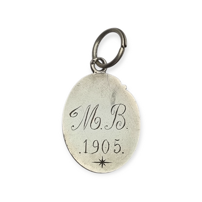 Silver medal pendant with chalice and host, European Art Nouveau design circa 1905