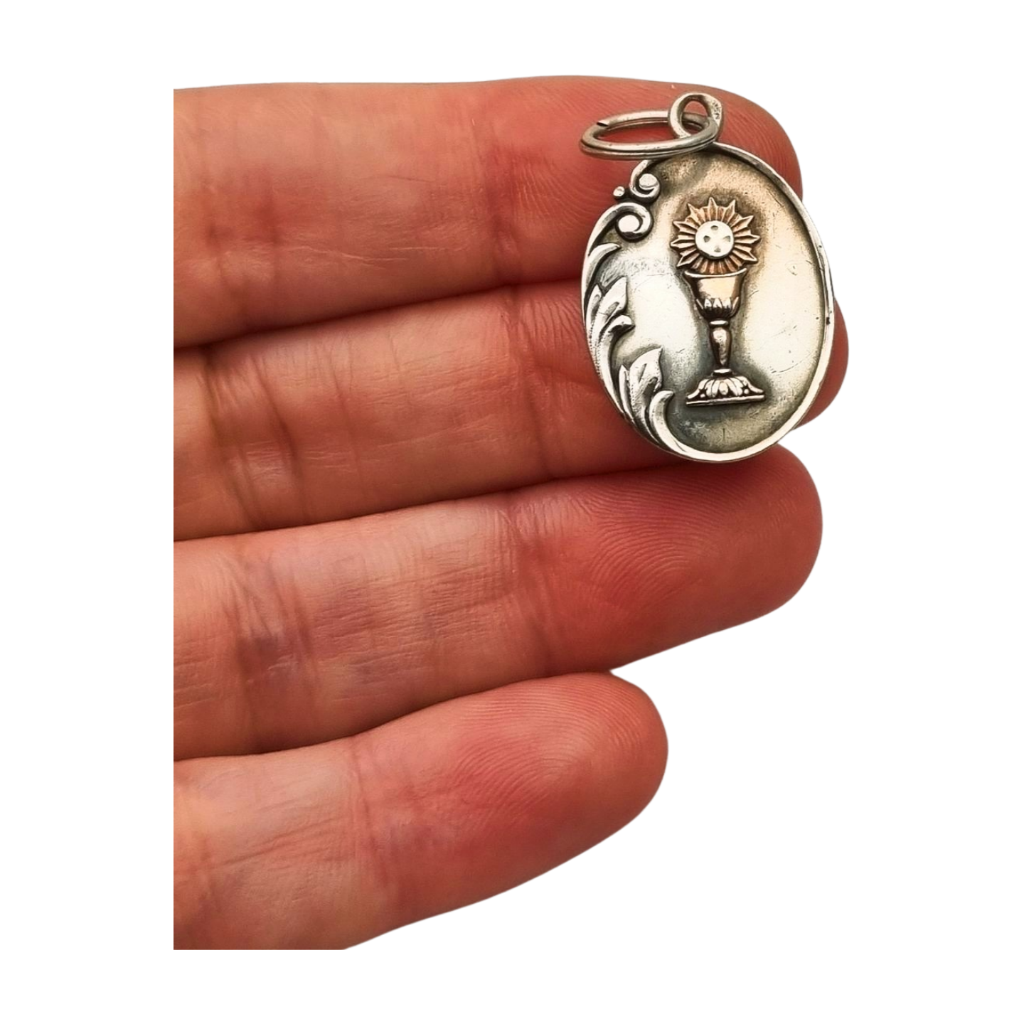 Silver medal pendant with chalice and host, European Art Nouveau design circa 1905
