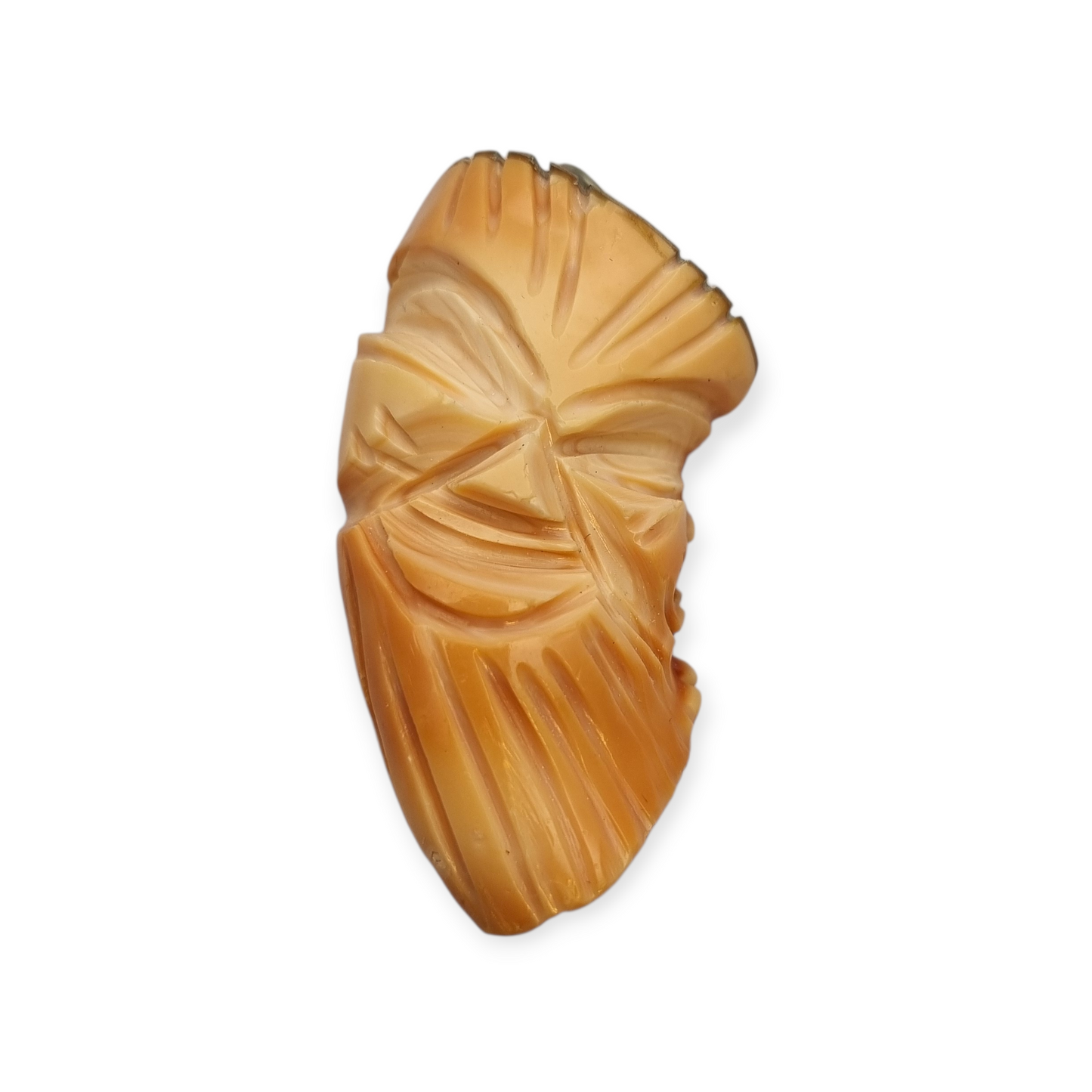 Colgante oriental con forma de máscara tallada en coral piel de ángel y plata, circa 1960-70