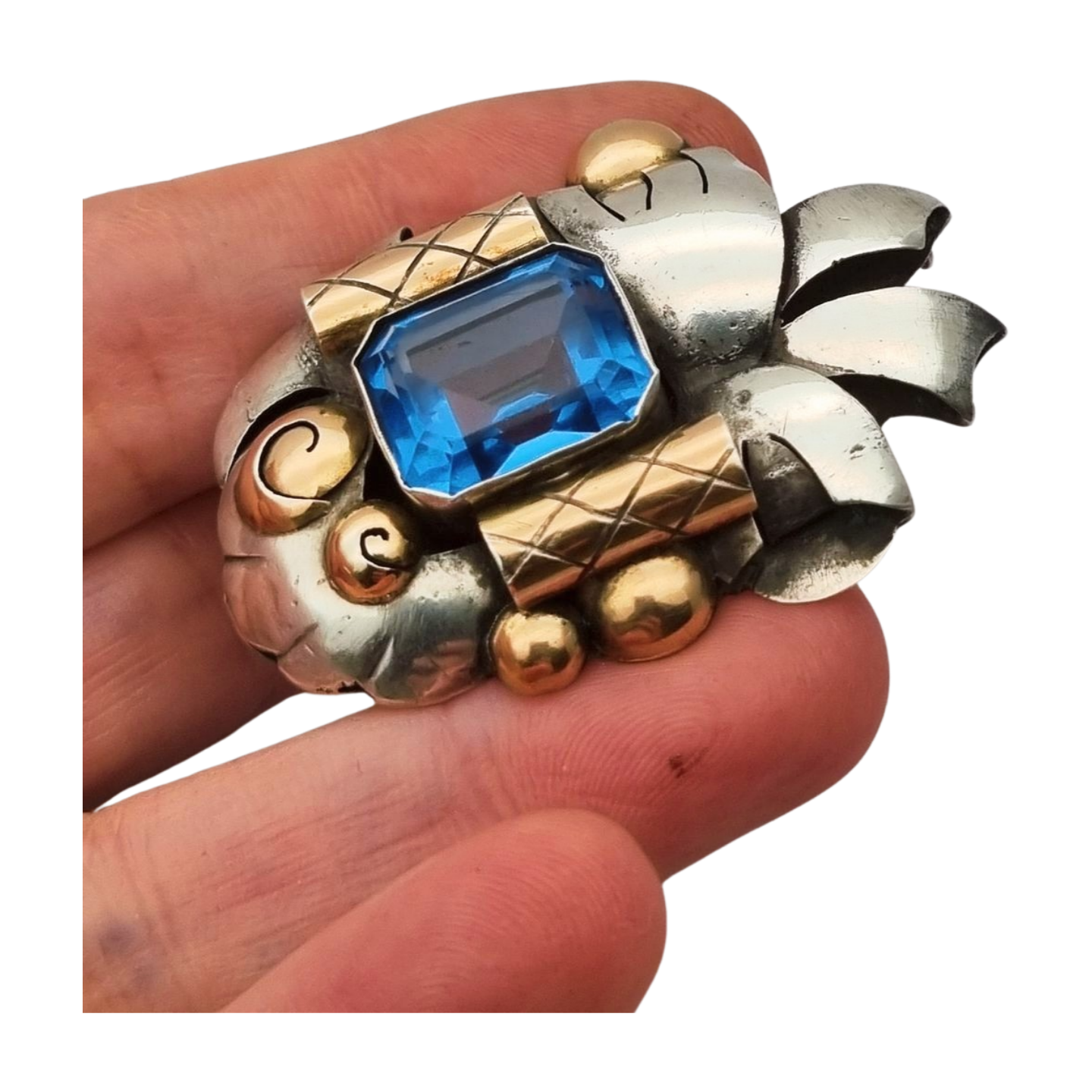 Broche Art Déco  Catalán en plata con vistas de oro y simil aguamarina, circa 1930-1940