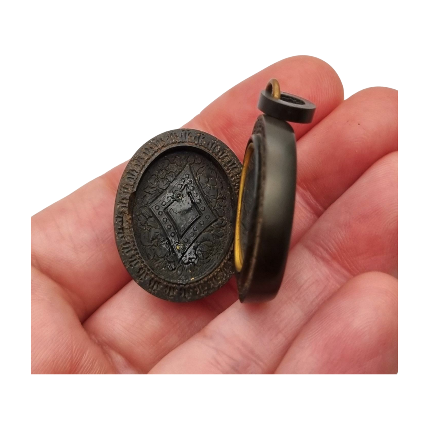 Antique Victorian vulcanite floral locket, circa 1880-1900, mourning jewelry