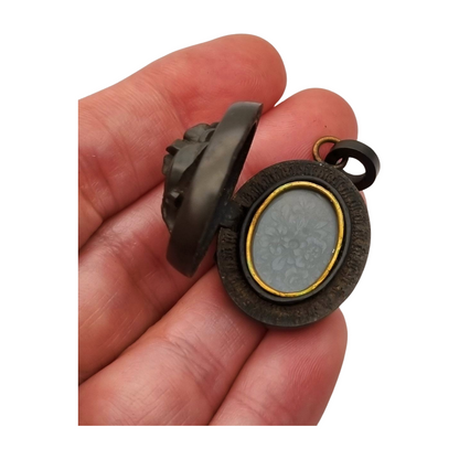 Antique Victorian vulcanite floral locket, circa 1880-1900, mourning jewelry