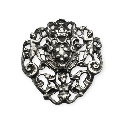 Neo-Renaissance silver brooch, heraldic shield with cherubs Italy 20th century