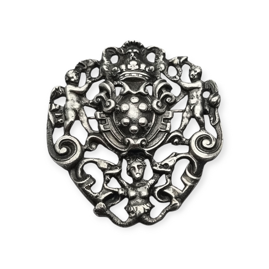 Broche de plata neorrenacentista, escudo heráldico con querubines Italia s.XX