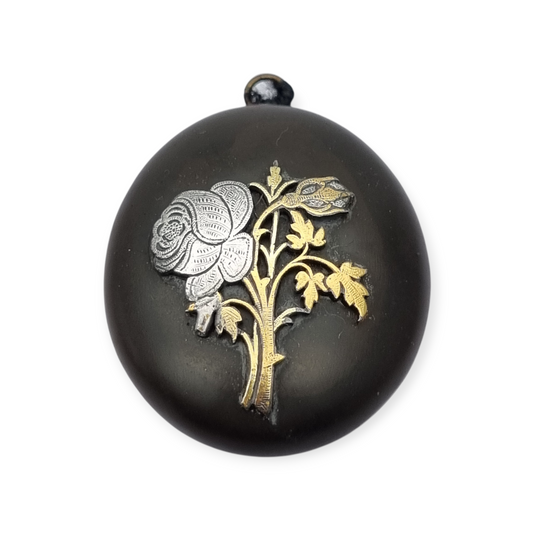 Victorian vulcanite locket, mourning jewelry, raised flower, England circa 1890-1900