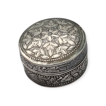 Caja redonda de plata 800, decoración floral grabada, circa 1980