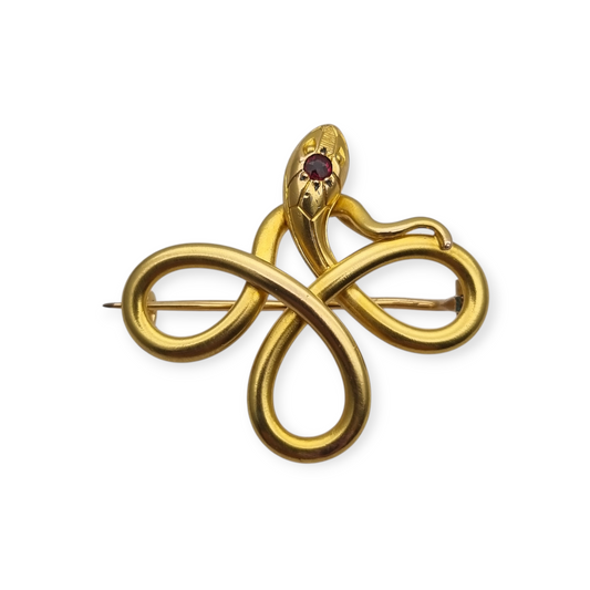 French FIX brooch with intertwined snake, rolled gold and red stone circa 1910