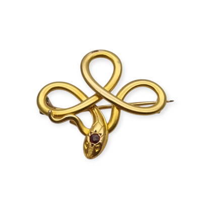 French FIX brooch with intertwined snake, rolled gold and red stone circa 1910
