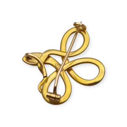 French FIX brooch with intertwined snake, rolled gold and red stone circa 1910