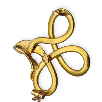 French FIX brooch with intertwined snake, rolled gold and red stone circa 1910