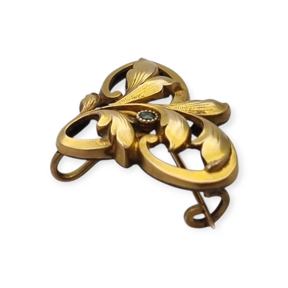 FIX Art Nouveau gold-plated brooch with green stone and floral design, circa 1920