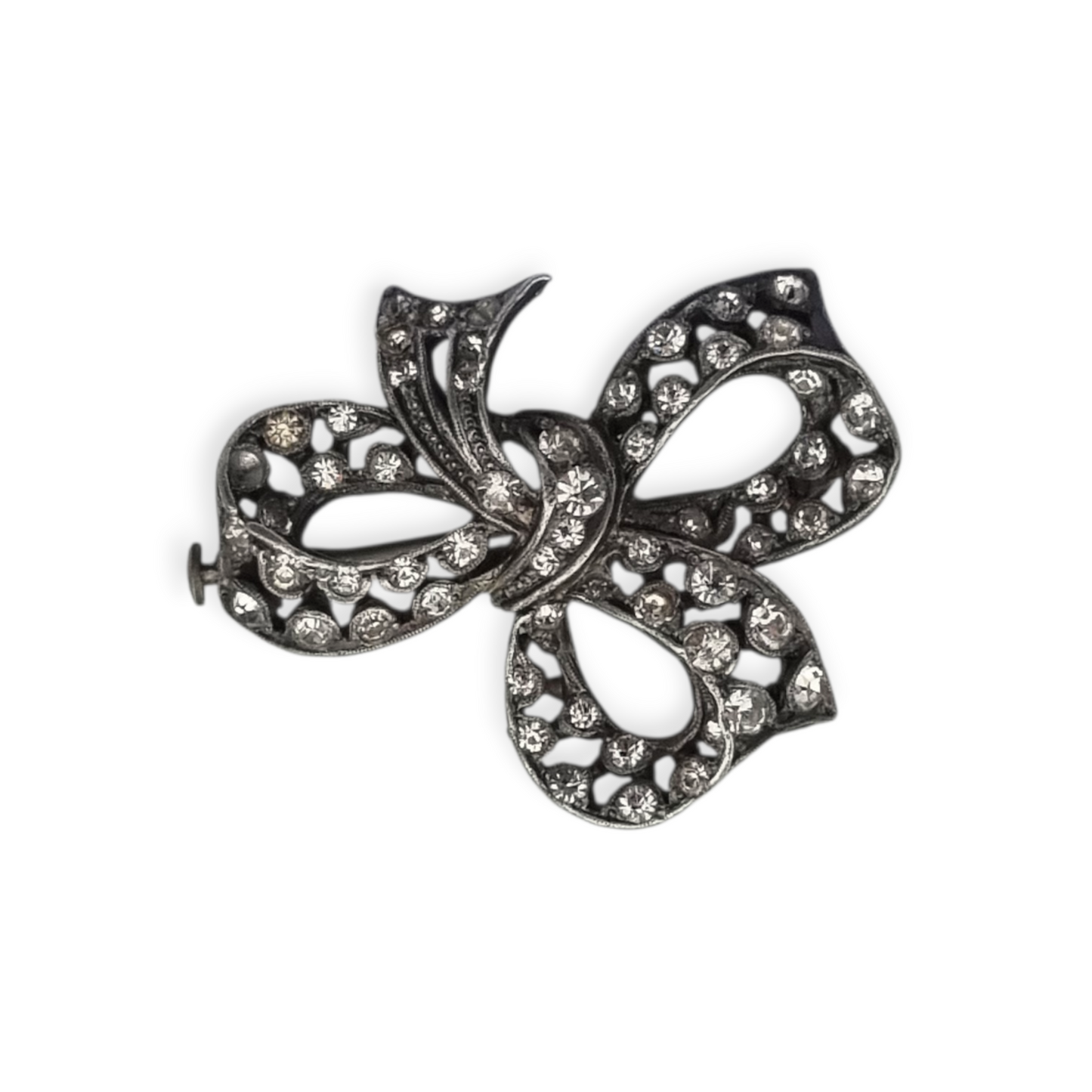 Bisutería antigua broche lazo Art Déco de metal plateado con pedrería, circa 1940-1950