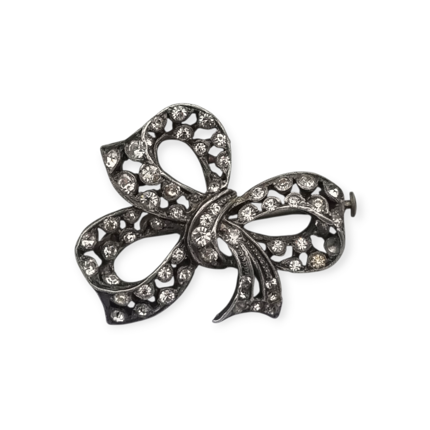 Bisutería antigua broche lazo Art Déco de metal plateado con pedrería, circa 1940-1950