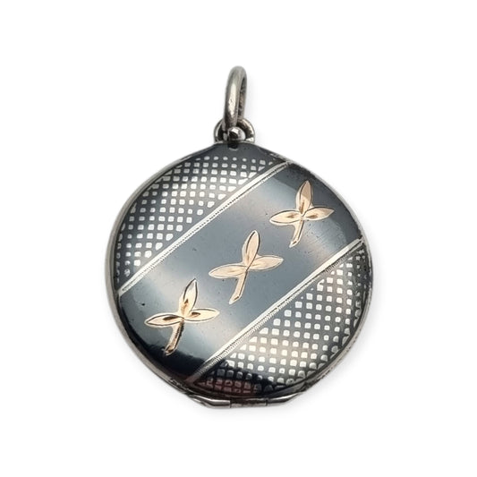 Round locket in nielloed 800 silver with hand engravings, circa 1920-1930