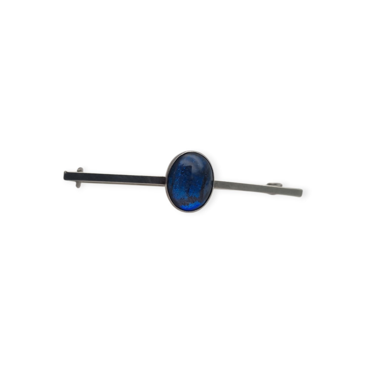 Broche antiguo de plata con cabujón azul ovalado, diseño minimalista siglo XX