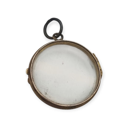 Colgante guardapelo antiguo redondo de metal y cristal biselado, circa 1920