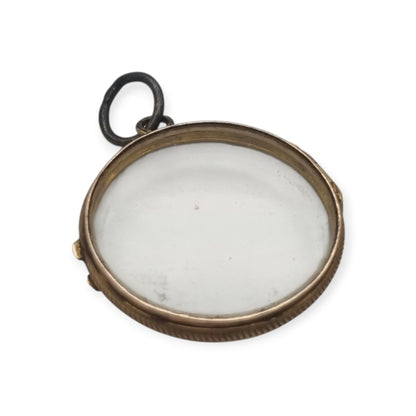 Colgante guardapelo antiguo redondo de metal y cristal biselado, circa 1920