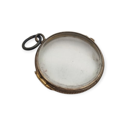 Colgante guardapelo antiguo redondo de metal y cristal biselado, circa 1920