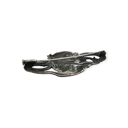 Art Nouveau 915 silver brooch with nymph, stars, and female profile, Europe, circa 1940