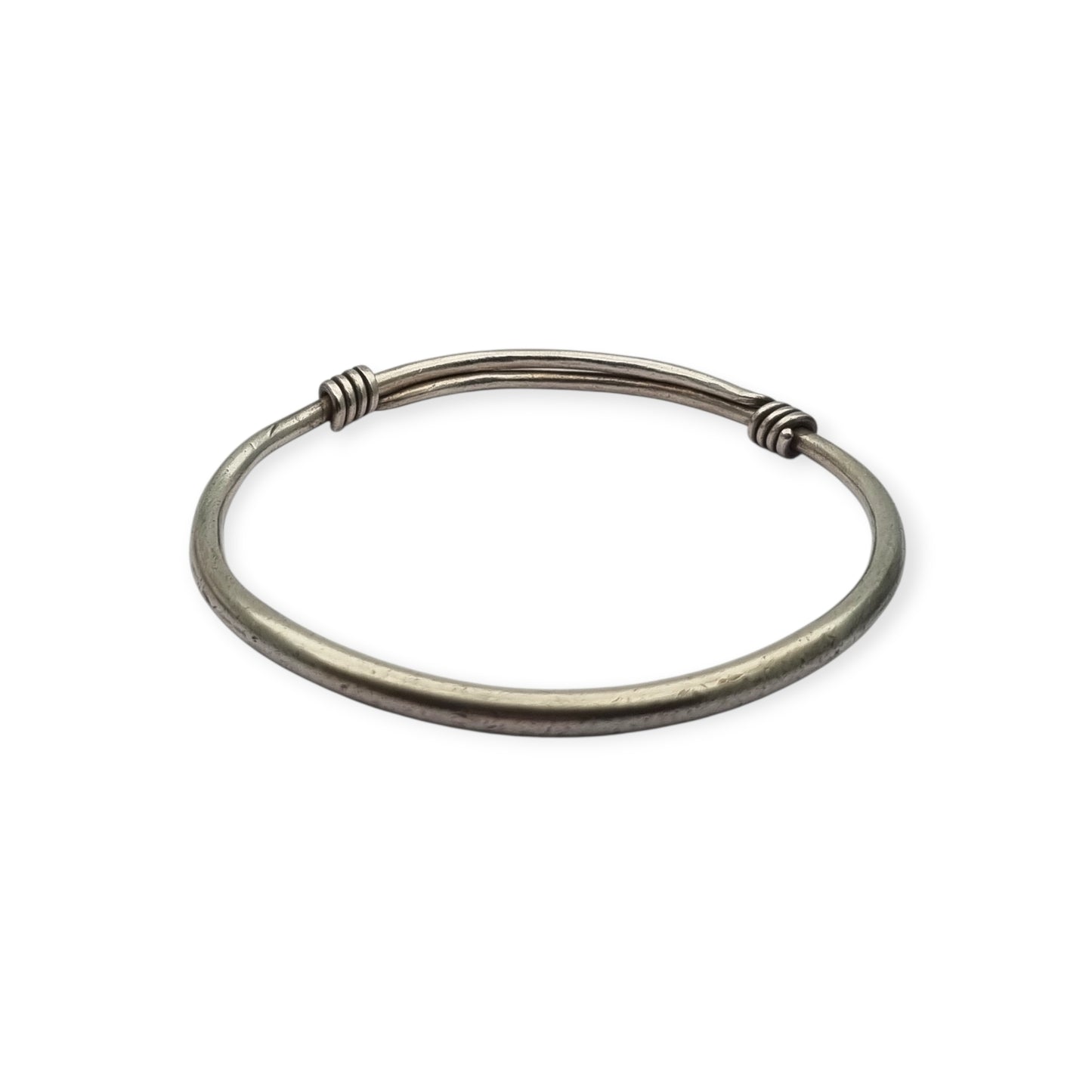 Vintage ethnic silver African knot bracelet, rigid artisan tribal bangle, 20th century
