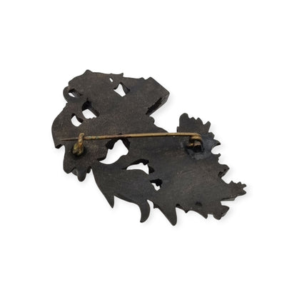 Broche de luto victoriano en vulcanita, cruz con hiedra y flores, Inglaterra, circa 1880-1900
