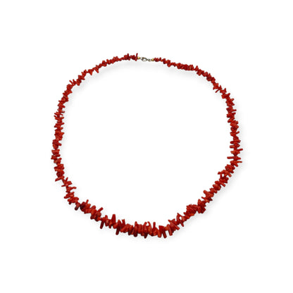 Boho necklace of natural red coral with irregular branches and metal clasp, circa 1970-80