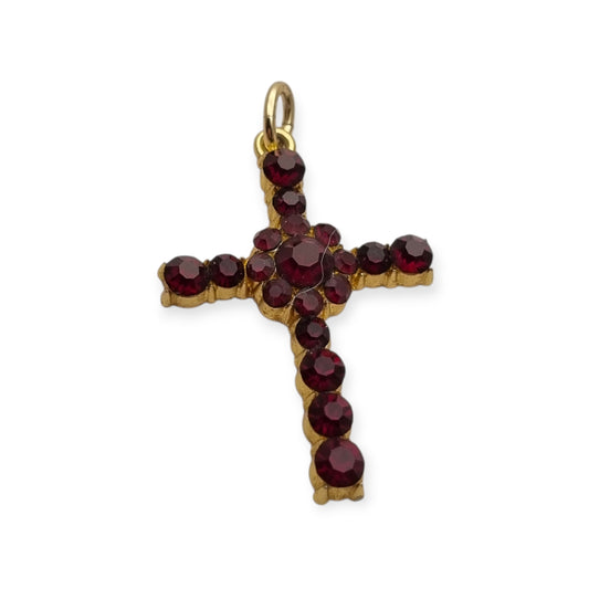 Vintage cross with garnet rhinestones and gold-tone metal religious style circa 1950